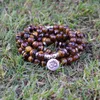 Gioielli da donna Uomo 8mm Tiger Eye Stone Tibetan OM Strand Handmade DIY 108 Mala Beads Yoga Bracciale o collana