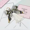 Держатель pronuvel моды шарфы Key Bowknot Изысканный украшения Кожа PU кисточки Keychains Женщины Сумка Шарм Подвеска EH-810