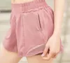 LU-33 Loose Yoga Hoty Hot Shorts Ficka snabba torr gym sport shorts dragsko elastisk midja brethable gym byxor sommarklänningar