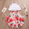 Baby Christmas Clothes Girl Dress Sets Senaste Sommar Nyfödd Baby Girl Set Girl Sling + Oregelbundna Blomkjol Hårband 3 Pieces Outfits