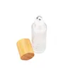 288 stks / partij 10 ml hoogwaardige bamboe roll on fles (stalen bal), bamboe cap bal parfum fles etherische olie fles LX3257