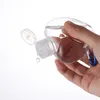 Bottiglia di alcol riutilizzabile per gel disinfettante per lavaggio a mano vuota da 50 ml con gancio per portachiavi Bottiglia da viaggio in plastica trasparente a forma di cuore DHL