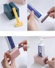 New Home Multi-functional Toothpaste Dispenser Facial Cleanser Squeezer Clips Rolling Toothpaste Squeezer Tube Bathroom Accessories KD1