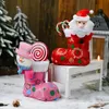 新しいクリスマスの装飾漫画の頭の明るい布のブーツ赤ピンクキャンディーブーツギフト小さな靴卸売ヨーロッパとアメリカ2021年新年