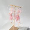 Haarklemmen Barrettes Korean Pink Butterfly Fairy Bridal Hoofdtooi is een witte bloem haarband oorbellen set bruiloft sieraden1