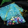 100pcsMoon Estrela Organza Bolsas Pequenas Natal com cordão saco do presente de jóias charme Embalagem Sacos Bolsas 7x9 9x12cm