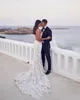 Steven Khalil Boho Beach Wedding Dress 2021 Sexig backless sjöjungfru brudklänningar V-ringning 3D spetsarapplikationer rem trumpet trädgård brud295s