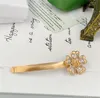 Hot Sale Small number of high-grade retro metal Diamond Earrings Flower hairpin