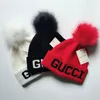 Luxury Beanies Hight kvalitet män och ull stickad hatt klassisk sportskalle kepsar kvinnor high-end casual gorros bonnet 32155