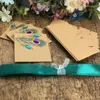 RMTPT 50pcsl Peacock Feather Candy Boxes Draign Design Wedding Favors Faux Rhinestone Kraft Paper Presentlådor 75x5x3cm13691158