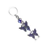 Porte-clés porte-bonheur mauvais œil, breloques papillon pendentif pompon, porte-clés de voiture en cristal pour femmes, bijoux à la mode, cadeaux 237y