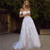 Nueva llegada Sexy elegante fuera del hombro Vestidos de novia de playa Apliques florales 3D Tulle Sweep Train Vestido de novia Vestidos de novia vestido de novia