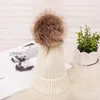 Bonnet d'hiver pour femmes, doublure polaire douce et épaisse, bonnet tricoté double couche avec fausse fourrure Pom Pom, chapeaux chauds d'extérieur à la mode9116004