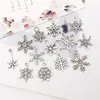 Weihnachtsserie Vintage Weihnachten Schneeflocke Ohrring Erkenntnisse Charms gemischt 70 Stück Antik Silber Dekoration Anhänger Schmuck Zubehör im Angebot