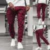 Homens casuais corredores calças sólidas finas de cargas de cargas masculinas Multi-bolso Calças Mens Sportswear Hip Hop Harem Lápis Pant