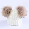 Mère enfants chaud hiver casquettes vraie fourrure Pom Pom Beanie laine tricoté chapeau pour bébé garçons filles pompon raton laveur boules Beanie Cap Bonnet