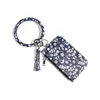 Ny plånbok Keychain Wristlet Armband Kvinnor Daisy Leaf PU Läder Tassel Kabaw Coin Bag Fashion Mens Keyring Holder Bil Nyckel Ring Ring Charm