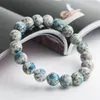 Mulher Homens esticam pulseira de pedra natural de cristal 11mm 12mm de granito genuíno azul cristal azul k2 jas por bracelete275o