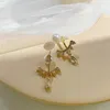 Versione coreana degli orecchini della pesca del diamante della perla adorabile personalità femminile amore orecchini della stella a cinque punte gioielli all'ingrosso