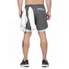 Nouveaux hommes 2 en 1 Shorts de course Gym Fitness musculation entraînement séchage rapide plage pantalons courts mâle été entraînement Crossfit bas5247594