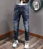 Cool Guy Biker Jeans Bleach Distressed Paint Bird Patch Accent Damaged Slim Fit Cowboy Pantalon Men2189