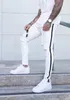 メンズ壊れた穴刺繍鉛筆ジーンズスリム男性ズボンカジュアルシンデニムパンツクラシックカウボーイヤングマンジョギングパンツ