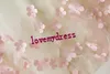 Pink Ivory New Quinceanera Robes Sweet 16 Girls 2023 MAINS MAINS FORES PERLS Perles en dente