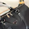 Moda siyah naylon duffle çanta 42cm bagaj çantaları erkek kadın omuz seyahat spor çantası büyük kapasiteli su geçirmez duffel çanta adj273v