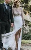 Sexiga Bohemian Bridal Gowns Boho Beach Bröllopsklänningar Se igenom 2021 3D Floral Appliques Illusion Långärmad sida Hög Split Vestidos