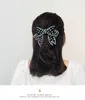 ラインストーンブラックボウカクノット女性女の子メタル格子縞ビッグクロスノットクリップヘアピンヘアアクセサリーヘッドウェア