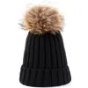 Winter new ladies knit cotton caps warm and comfortable loose thick raccoon fur pom-poms men and women general ski hats Beanies