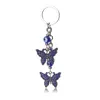 Porte-clés porte-bonheur mauvais œil, breloques papillon pendentif pompon, porte-clés de voiture en cristal pour femmes, bijoux à la mode, cadeaux 237y