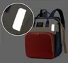 حقيبة الحفاضات متعددة الوظائف طفل قابلة للطي أكياس سرير الأمهات وظهر حقيبة الظهر الأمومة حقيبة اليد حقيبة حقيبة اليد Drop234a