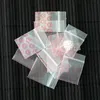 Целый ряд 300pcs Clear Self -герметизирующий запечатывание на молнии пластиковый пакет 3х4 см мини -Ziplock Dewelry Beadry Serging