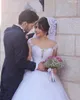 Luxury Arabic Dubai White Ball Gown Wedding Dresses Lace Long Sleeves Sheer Neck Appliques Train Garden Bridal Gowns Formal Bride 259Y