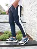 Herrenhosen Männer Hosen Sport Slim Hip-Hop Printed Jogger Streetwear Joggshose Harem Pant Overalls European American