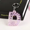 1 قطعة كيرينغ 26 كلمة إنجليزية حرف إنجليزي إلكتروني Keychain بريق الراتنج أ لسحر حقيبة يد للمرأة 1