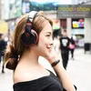 Livraison gratuite sur l'oreille basse stéréo Bluetooth casque sans fil casque Support Micro carte SD Radio Microphone