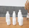 30ml 50ml 100ml White Empty Spray Bottles Plastic Mini Refillable Container Empty Cosmetic Containers PETG Alcohol Bottle