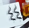 2020 Hot sale nightclub Exaggerated Earrings gold silvery black ellipse Retro frosted Spiral hollowing long Earrings 89mm & 86mm
