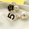 Fooderwerk smycken pärla nummer 5 lång dingle chain designer lyx brincos orecchini örhängen för kvinnor17616106