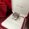 Das neue Gold und das Silber ausgehöhlten ausgehöhlten Diamond Leopard Head Schmuck Ring Fashion Domineering Pseudo Goldringe als Geschenk4174348