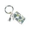 Ny plånbok Keychain Wristlet Armband Kvinnor Daisy Leaf PU Läder Tassel Kabaw Coin Bag Fashion Mens Keyring Holder Bil Nyckel Ring Ring Charm