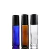 En gros épais 10 ml verre rouleau sur bouteilles ambre bleu clair vide bouteilles de parfum à bille avec couvercles noirs livraison gratuite 1000 pcs/lot LX32