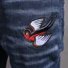 Cool Guy Biker Jeans Bleach Distressed Paint Bird Patch Accent Damaged Slim Fit Cowboy Trousers Men254Y