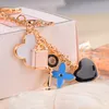 Good Luck Clover keychains Fashion Brands Key Chain Flower Keyrings Metal Key Ring Women Bag Charm Pendant Car Accessories