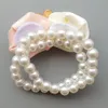 Vita pärlor pärlor brudtärna handled corsage siden rosblommor handgjorda bröllopsfest tillbehör leveranser brudband simulat6934032