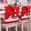 Enviar desde cubierta de la silla de EE.UU. 10Pcs 2020 Top Decoración de Navidad de Santa Claus Cocina Silla Tabla Covers Casa Decoración Casa De Chaise