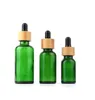 Flacon compte-gouttes d'huile essentielle vert clair de 20ml 30ml 50ml avec couvercle en bambou, bouteilles en verre de 5ml 10ml 15ml, 100 pièces, vente en gros