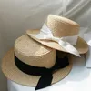 Nya Simple Women Summer Beach Raffia Black White Ribbon Hat Bow Temperament Flat Top Straw Hats Women's Sea Beach Hat